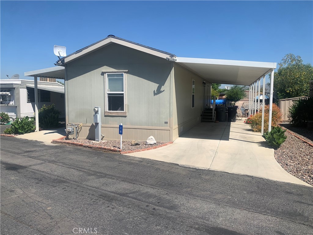 This immaculate, move-in-ready mobile home offers a blend of comfort and convenience in a vibrant community. The home is beautifully maintained, featuring a clean, modern interior that is ready for you to settle into. Enjoy the convenience of being close to shopping, dining, and salons—all within walking distance. The community amenities include a refreshing pool and a well-equipped center, perfect for socializing and recreation. Experience a relaxed lifestyle in a welcoming neighborhood with everything you need just a stone's throw away.