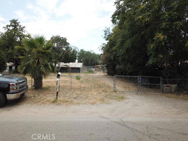 Investors dream with so much potential. Extra large lot, fully fenced includes a small home, unfinished apartment, barns and many fruit trees. You don't want to miss out on your chance to fix up this little gem. Association Amenities: None # of RV Spaces: 0 Special Features: BA,OBNONE Lot Location Type: Standard Location # of Attached Spaces: 0 # of Detached Spaces: 0