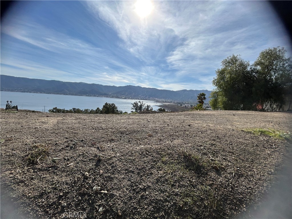 11 lots side by side that total 55,317 sq ft located in the Country Club Heights area with a panoramic views of the mountains and lake. A beautiful site to build a few houses with a million dollar view. Buyer and Buyers agent to verify all information with the City planning department. Lake views that won't disappoint!! This lot is located in the desirable Country Club Estates above Lake Elsinore. These lots have views in every direction! Enjoy beautiful sunset views or even watch the boats on the lake. This unimproved lot is full of potential and could be your very own piece of paradise. Don't miss out on this opportunity to own this gorgeous lot!
The parcels included in sale are as followed 375-181-044,008,009,010,011,012,013,014,015,016,017