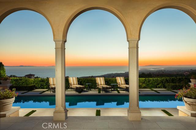 Savor boundless ocean vistas from this European masterwork in the distinguished sanctuary of Crystal Cove. Custom built in 2013 by Pridemark and designed by renowned architect Richard Krantz, the extraordinary, three-level, Mediterranean-style estate encompasses approximately 11,878 square feet of living space punctuated by expansive Albertini sliding glass doors in the great room offering picturesque ocean, Catalina, Newport Harbor and coastline views. Resort-inspired grounds lend way to outdoor covered loggias with fireplaces, saltwater pool and spa, and unparalleled landscapes by Greg Grisamore. Inside this refined estate — with interiors designed by Robert Ricker —discover six bedroom suites (including a main-level master suite); two offices; a world-class gourmet kitchen with separate catering kitchen; billiard room; fitness room with sauna and steam shower; beauty salon and massage room, 18-person home theater designed by Audio Visions; Savant home automation system; wine cellar; elevator; and 9-car clear-span subterranean garage. Access to the exclusive Crystal Cove amenities, including 24-hour guard gate, swimming, fitness and tennis facilities, playgrounds, the region’s best schools and Crystal Cove State Park.