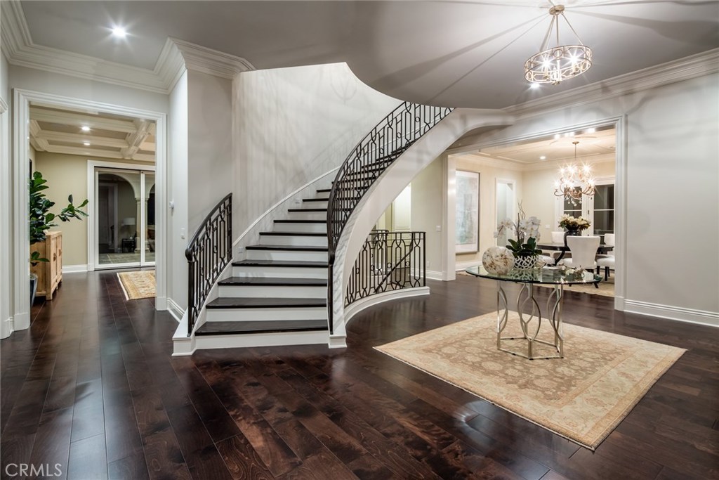 This brand new magnificent Italian Renaissance estate is located in one of the finest neighborhoods in San Marino. Meticulously constructed by Building Worx with the finest materials and craftsmen available. This home possesses every possible feature and amenity you could think of to include a gourmet chefs dream kitchen plus a preparation kitchen open to a large family room with fully opening doors which overlooks the spectacular backyard featuring two covered outdoor living areas, a spectacular pool and spa, and gorgeous landscaping. Additional features include a finely detailed office, a spacious formal dining room, a wine tasting room with a walk-in temperature controlled glass enclosed wine storage room, a billiard room, home theater, gym, and an elevator that goes to all three levels of the home. The amazing master suite features wonderful views of the mountains, two large decks, one covered, a fireplace, retreat, and a huge walk-in fully built-in closet. You will never have to take another vacation; this home is like a fabulous resort. The main house is approximately 5,300 sq ft and the finished basement is approximately 2,400 sq ft as per the builder.