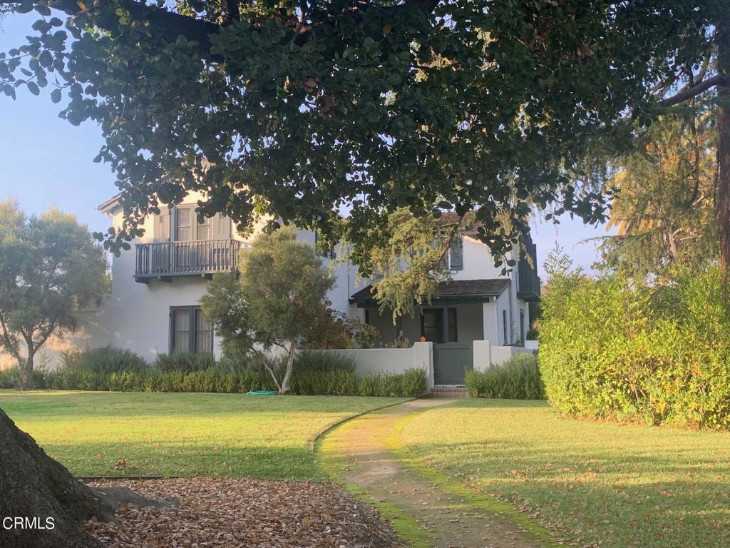 Gracious Monterey Colonial Revival designed by Johnson, Kaufman & Coate. Beautifully updated rooms including kitchen and baths. Tile and oak floors, French doors, and many rooms with windows on three sides. Fireplaces in living room and primary suite. Deep lot with mature trees.