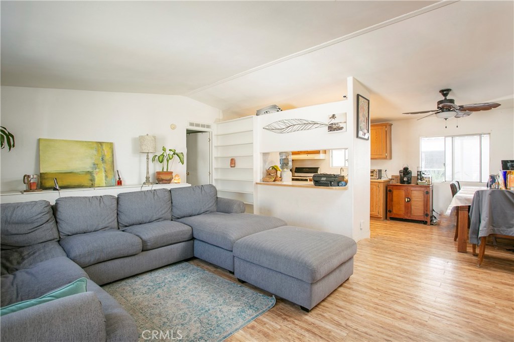 Motivated Seller! Check out this home before it's too late! Sea Aira Estates Gem located just minutes away from the ocean and downtown HB. This 1995 Double Wide Skyline boasts a larger enclosed lot, 3 Bedrooms, 2 baths, with vaulted ceilings, inside laundry situated off kitchen. Breakfast bar opens to kitchen, dining area at end of kitchen that opens to the living room. Living room offers extra storage. Master bedroom Bathroom recently remodeled. Natural light shines through energy efficient windows. Including a New Roof. Hard Laminate Flooring, Ceiling Fans. Community offers heated pool, spa, clubhouse, billiards, picnic/BBQ area, and youth playground. Land Lease Amount is $1,249 per month. All situated just minutes from sandy beaches, great schools, shopping, parks