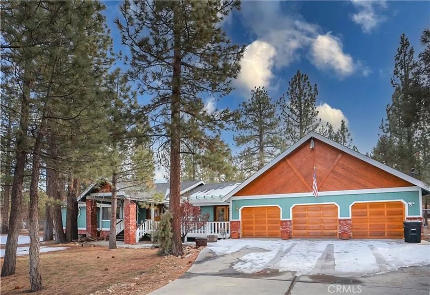 Experience the perfect blend of rustic charm and modern comfort in this beautiful Big Bear home. This spacious single-story retreat offers 2,271 square feet of thoughtfully designed living space, complemented by a stunning outdoor setting. The expansive living and dining areas create a welcoming atmosphere, ideal for cozy evenings with loved ones. Sliding doors open to a covered porch, providing a peaceful space to relax and enjoy the views of a beautifully fenced backyard. The porch isn't just a place for morning coffee—it’s your front-row seat to the soothing sounds of nature. Inside, the generously sized primary bedroom features a private, luxurious bath with a jetted tub, offering the ultimate spa-like experience at home. This property isn't just a house; it's a lifestyle. Approved plans for an Accessory Dwelling Unit offer endless possibilities—whether it's a guesthouse, art studio, or rental property. The choice is yours! Bring your dreams, your family, and your passion for life—this Big Bear gem is ready to be your new home. Who says you can’t have it all? With this home, maybe you really can!
