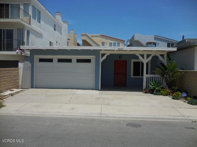 Come fall in love with this awesome little beach home, one block away from the sand! The first thing you will notice is the bright red Dutch door, perfect for letting in the ocean breeze. When that breeze is a little too much, close up the doors and light up a cozy fire! The kitchen features beautiful wood cabinetry, granite counter tops, and all stainless steel appliances. Master bedroom has private access to the backyard, which is beautifully landscaped. 2 car garage + driveway parking. No utilities included. Small pet ok.