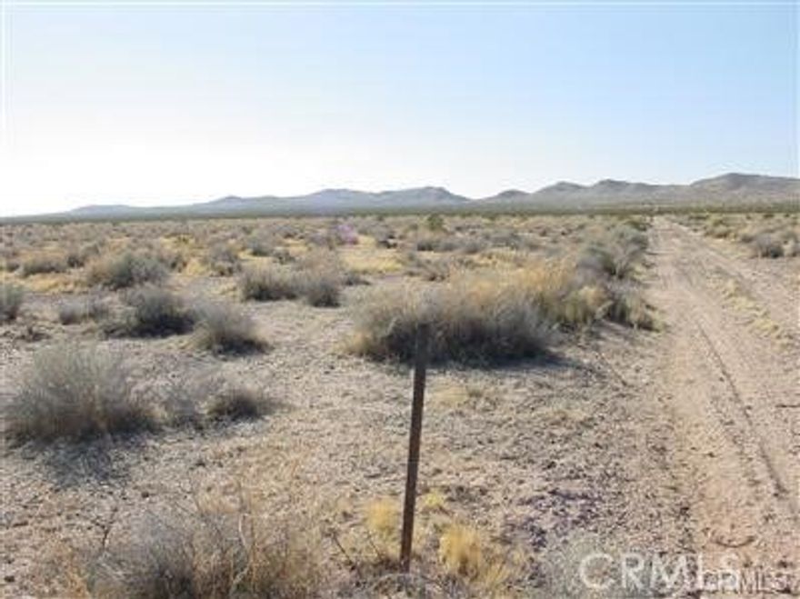 Investment property for the future. Beautiful, peaceful, desert valley with dirt road access. Access Type: Public Access # of RV Spaces: 0 Zoning Description: Residential 1 Lot Location Type: Standard Location Development Status: Raw Land Frontage Type:  Dirt Road Miscellaneous: Other Utility Adjc to Site: None # of Attached Spaces: 0 # of Detached Spaces: 0 # of RV Spaces: 0