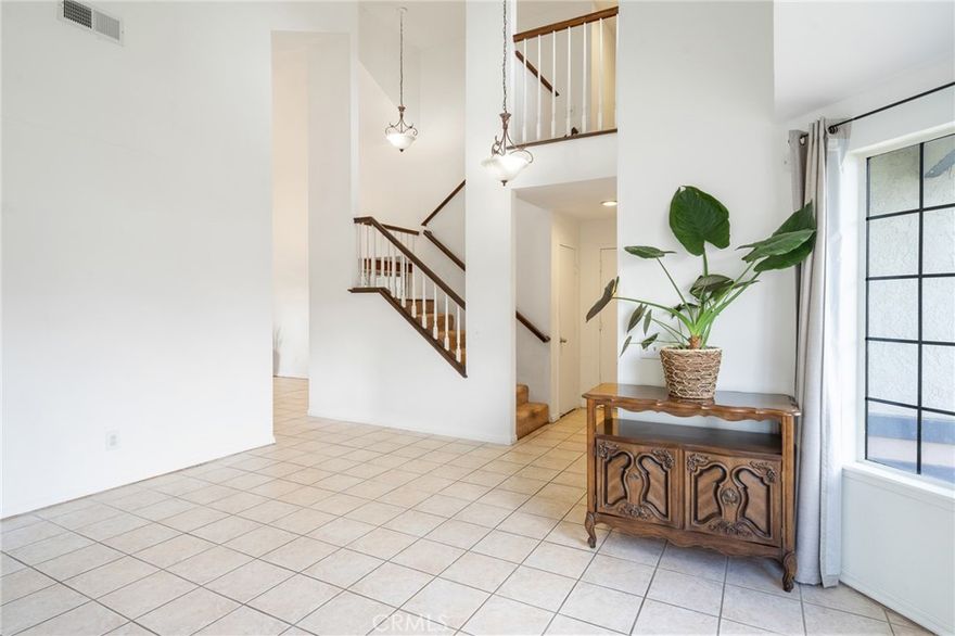 Get ready for the SUMMER with this fantastic POOL HOME with JACUZZI AND PAID SOLAR PANELS!  Big Lot with room for all your TOYS!  RV/BOAT PARKING, large covered patio areas, dog run, sparkling pool and relaxing jacuzzi!  Inside, the house is spacious, open with a formal living room and back family room with fireplace.  Total of 3.5 bathrooms; one bathroom is NOT permitted.  The formal dining area has a French door that leads to a covered back yard patio. Kitchen is spacious with stone counters & plenty of storage. Soaring ceilings and a dramatic staircase lead you upstairs where you'll find 3 bedrooms and 2 more bathrooms.  Big Primary Bedroom with REMODELED BATHROOM and Walk-In closet.  Bonus room with bathroom off of the family is NOT permitted.  Buyers to do their due diligence on permits and ALL details of the property.