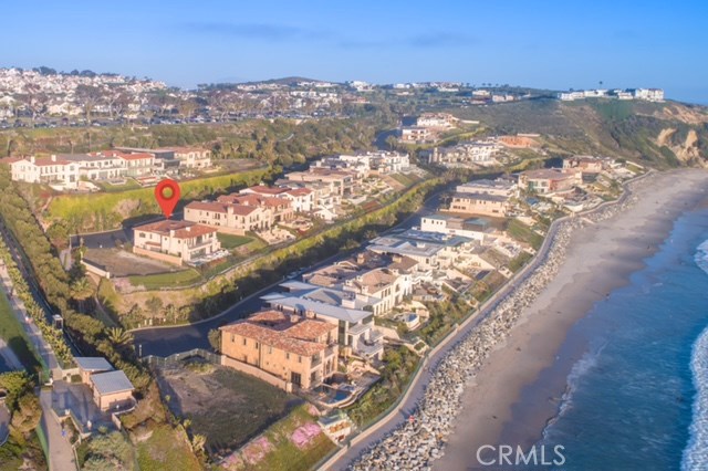 Incredible 2nd row Value!! This Monterey-style custom beach home, situated just steps from the beach at The Strand at Headlands, affords a world class, relaxed lifestyle in Orange County’s final oceanfront community. This two-story home showcases expansive ocean views, exquisite indoor outdoor living spaces, and state-of-the-art amenities. The home offers 4-bedrooms and 4½ bathrooms and provides the ultimate beach lifestyle. Watch for breaching whales and enjoy panoramic ocean views from the Great Room and ultra-contemporary chef’s kitchen that features Wolf and Subzero appliances. A sweeping staircase will lead to the home’s ocean view master bedroom, cozy retreat, spacious master bath and walk-in closet. Upstairs you will also find two additional bedrooms, laundry room and an oversize bonus room. The home is equipped with an elevator, central vacuum and "living wall."