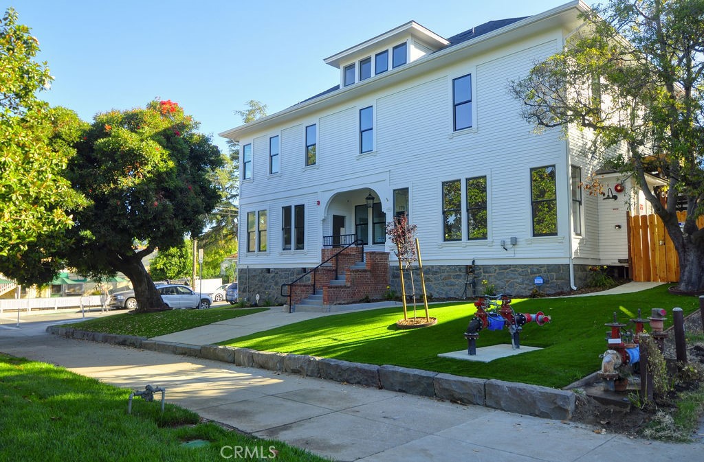 Welcome to the historic Allen House – an early 1900s era home built in the “railroad-vernacular” architecture and located in the beautiful Historic Downtown District of San Luis Obispo. This unique R3 zoned property was significantly renovated in 2023 from the top down, making it ready for generations to come. The property is comprised of a single structure (4,688 SF) containing two units and a total of 17 bedrooms, 2 kitchens, and 4.5 bathrooms. The smaller ADU unit contains 3 bedrooms and 2 bathrooms with it’s own private entrance and kitchen, and the primary home contains 14 bedrooms, two full bathrooms (2nd floor bathroom has two toilets and two showers), one half bathroom, living room, dining room, commercial kitchen, and a covered patio. There is also a detached garage that is ideal for storage. All renovations are fully permitted with the City of SLO and performed by the most reputable local companies in town such as: AGD Architecture + Design, Michael Kalin Structural Engineering, Ed Cuming Construction, Zara Khan Interior Design, and many more trades and subcontractors. Improvements include: New carpet and luxury vinyl plank flooring, new doors, interior and exterior painting, new aluminum clad wood frame windows by Lincoln, new drywall, new kitchen cabinets & countertops, new appliances, new lighting, remodeled bathrooms, new electrical wiring with 400 amp panel & new plumbing lines, pre-wired for EV charger in garage, new sewer lateral connection to street, new roof, new fire escape stairs, whole house fan on third floor, new skylights, Navien tankless water heaters, one inch water meter upsize from previous 5/8 inch, new gutters and downspouts, new concrete and new decking in backyard, front and backyard artificial turf, reinforced foundation supports with new beams/posts/footings, commercial grade 4 inch fire sprinkler line from water main to house with Wilkins double check valve backflow preventer, and much more. This property is an ideal opportunity for those seeking strong rental income as an investment or simply wanting a large residence for a family or multiple families. The Downtown SLO location and R3 zoning allows for flexible alternative uses (with a permit) such as: Bed & breakfast, hostel, religious assembly, school, continuing care, elderly care, day care, fraternities or sororities, hospice, and more. The Allen House is a once in a lifetime opportunity to acquire a legacy property with over 125 years of history.