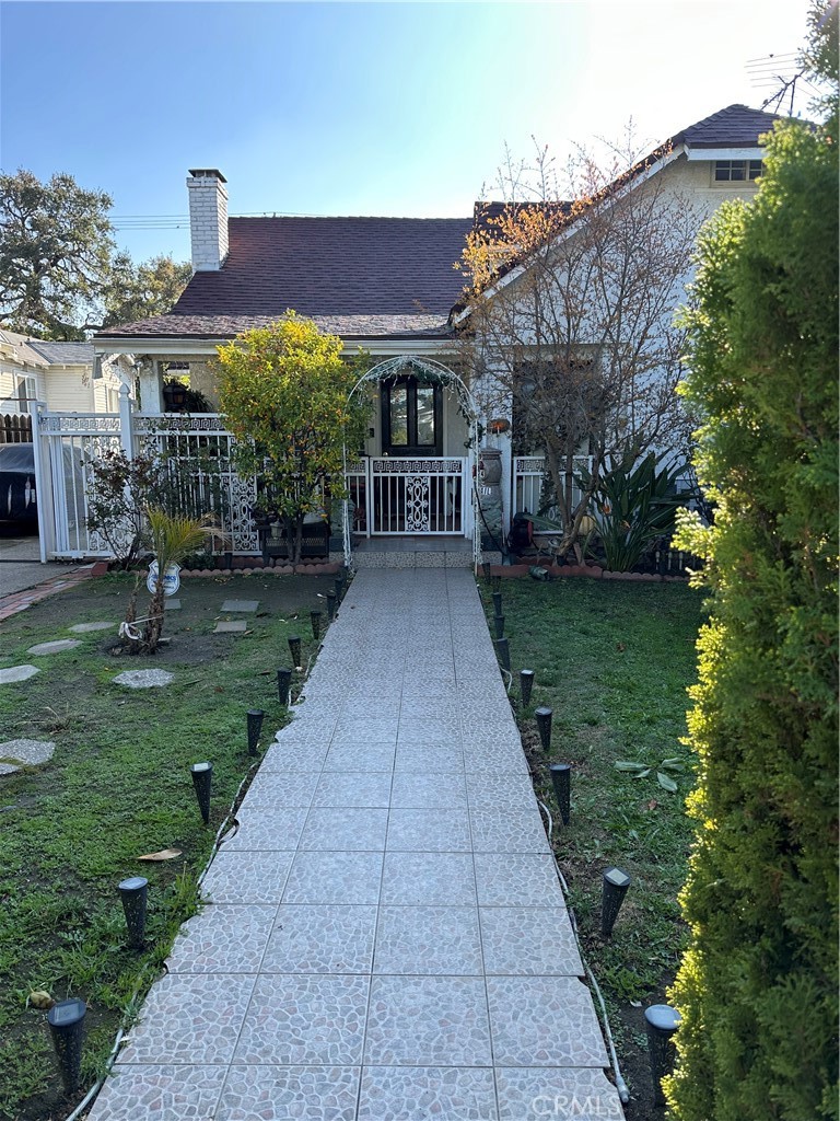 Prime Triplex. The front house is a 2 bedroom 2 bath plus a 1 bedroom 1 bath. The rear house is a 2 bedroom 2 bath. Long term tenants - huge upside potential in rents.