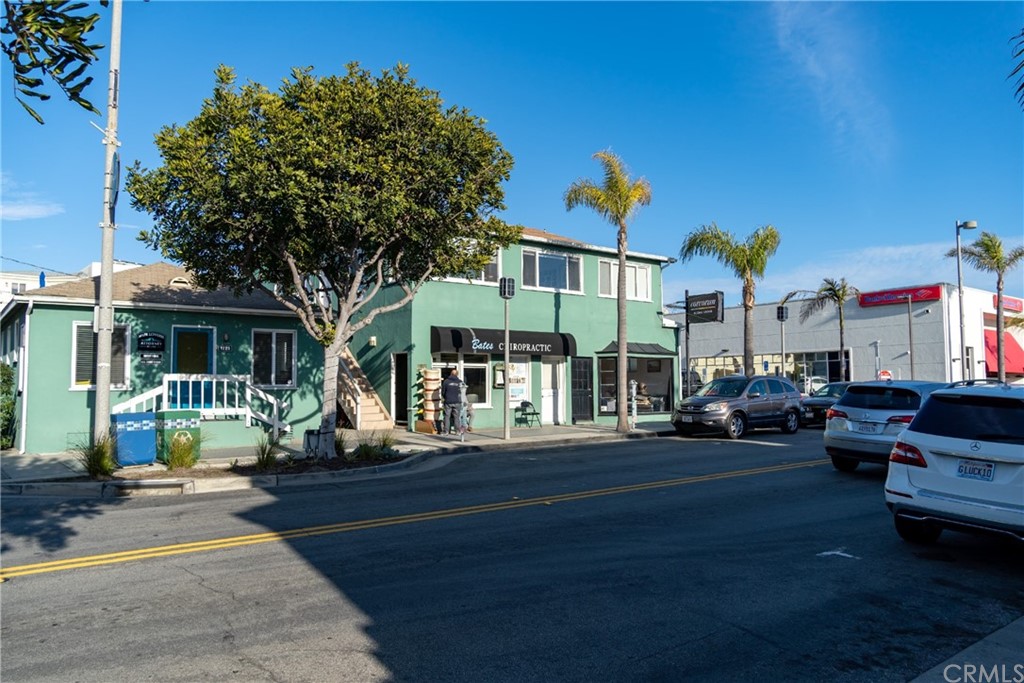 An absolute gem of a commercial development property! Located in the heart of downtown Manhattan Beach, an
upscale beach community 35,000 year- round residents and nearly 4 million annual visitors, an offering of this kind
almost never hits the market. Sited 2 short blocks from the renowned Manhattan Beach Pier and pristine two mile
long beach, the spacious 6,534 sq. foot double lot offers expansive ocean views and all essential elements to
support multiple business operations, including mixed use zoning, ample parking, high visibility on a flat buildable
corner lot, city utilities, and much more. Very close distance to award-winning restaurants, quaint cafes, coffee
shops and luxury boutiques, this extraordinary legacy property has been owned and managed by the same families
for the past 50 years and only recently has come onto the market. Don't miss this rare development opportunity,
as it is unlikely to be available again in our lifetime! The virtual picture has been changed by the color of the
building to a contemporary color. The original picture is showing the building green with white trim and will
remain on the photo roll, the new virtual color is grey beige with black trim and black doors which we are
disclosing as the look that can be easily achieved.