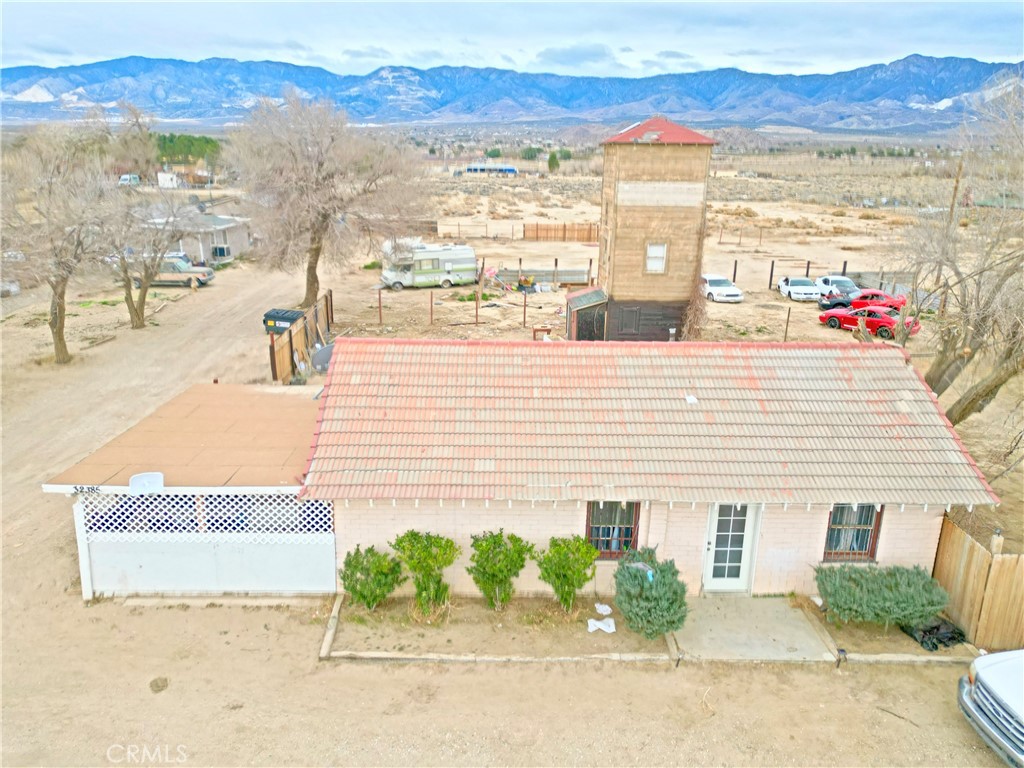 This 2- acre downtown Commercial with 3 separate buildings: 1,676sf, 936sf and 740sf. All are being rented out as residential. The property has its own well and water is also available from water company on streets.
All utilities available. Zoning is LV/CR - Rural Commercial.