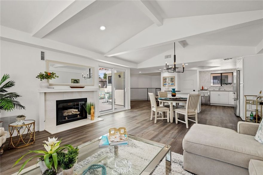 Want to get into Manhattan Beach? Be the first to live in this just, fully renovated townhome and benefit from modern, open living spaces with a huge deck for entertaining and the advantage of your kids attending top rated Manhattan Beach schools. 4 spacious bedrooms, 2 1/2 baths, A/C, Open kitchen with breakfast bar, new cabinets, quartz counter tops, new appliances and a service lift from the parking area up to the kitchen for your groceries. The kitchen is open to a large dining area and living space with a fireplace. Every surface has been replaced and updated, painted inside and out, new flooring, new baths with all new fixtures and cabinets. Laundry area closet is on bedroom level. There is a tandem 2 car garage plus a designated parking space. Low HOA dues! Walk to shopping, Performing Arts Theatre, restaurants, bars, running track and soccer field, schools, Polliwog Park, Trader Joe's. Aproximately 2 miles to the best beach in the south bay. Easy freeway access.