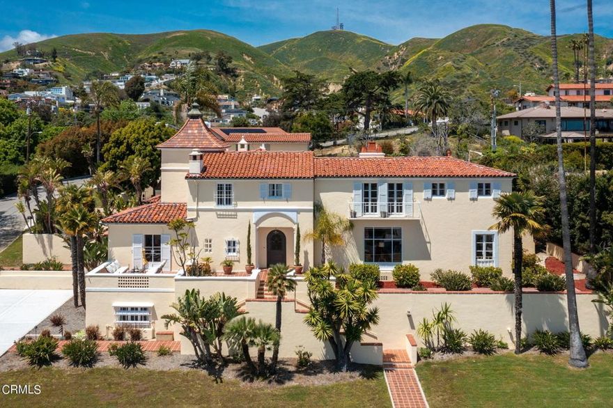 Rarely does a property such as this quintessential Spanish beauty come on the market.  Architect Harold Burkett designed this home for the Lovorn Family in 1929, later sold to the Lloyd Corporation, then acquired by Edith Hobson in 1952.  The Phillips family purchased in 1972 and sold to Julia Campbell in December of 2021 and welcomed the community to enjoy this property with her warmth and generosity.  The grand salon gives you a glimpse of years past when parties thrived and entertaining was a passion.  Beautiful original hardwood flooring, architectural elements such as carved corbels and mantels, massive high ceilings, stained glass windows, are but a few of the stunning features.  The island and ocean views are incredible from the Grand Salon as well as from the Main bedroom suite, Guest Suites and Office.  The property boasts 6 bedrooms and 6 baths with 3 bedroom upstairs ( one being the Master Bedroom quarters) as well as 2 bedrooms on the guest wing off the solarium, and another bedroom off the kitchen.  The main office could be used as a library and has a lovely patio area with unobstructed ocean and island views. The dining room is truly magnificent with seating for 18+, custom Flavio Poli Murano glass chandeliers and sconces, hardwood floors and french doors opening to the private sanctuary courtyard.  Off the dining area, is a butler pantry for serving and hosting. The estate includes a second garage with a 1 bedroom apartment.  This property is not to be missed for a discerning buyer that understands the blend of architecture with culture and warmth.  You have to experience this in person to understand how special this property truly is. Property shown by appointment for qualified buyers.