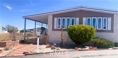 Welcome to our spacious manufactured home located in Victorville, California! Situated in a vibrant 55+ community, this property offers a comfortable and convenient lifestyle with a range of amenities and easy access to shopping and the 15 freeway. Here's a closer look at what this home has to offer:
Location: Victorville, CA, near shopping and with convenient access to the 15 freeway.
Community: Enjoy the perks of residing in a gated 55+ community, complete with a pool, spa, dancing lessons, pickleball courts, pool table, and clubhouse. One of the largest homes in the community, boasting three bedrooms and two bathrooms. the lot is positioned on the largest lot at the corner of a cul-de-sac, offering ample space and privacy. You can relax and entertain on the covered patio, perfect for enjoying the California weather.
As you step inside to find an open living room flooded with natural light from dual pane windows and doors. Stay comfortable year-round with a swap cooler and central A/C system. The spacious kitchen features a breakfast bar, double oven, and plenty of cabinets for storage. You can host family dinners in the large dining room, complete with a built-in China cabinet. as you retreat to the primary bedroom, which includes a private bathroom with a soaking tub. You can Park with ease in the covered carport, with space for two vehicles. This home comes equipped with a shed, washer and dryer, and refrigerator for added convenience. Whether you're looking to relax by the pool, stay active with pickleball, or simply enjoy the comfort of your spacious home, this property in Victorville offers the perfect blend of community living and modern comforts.