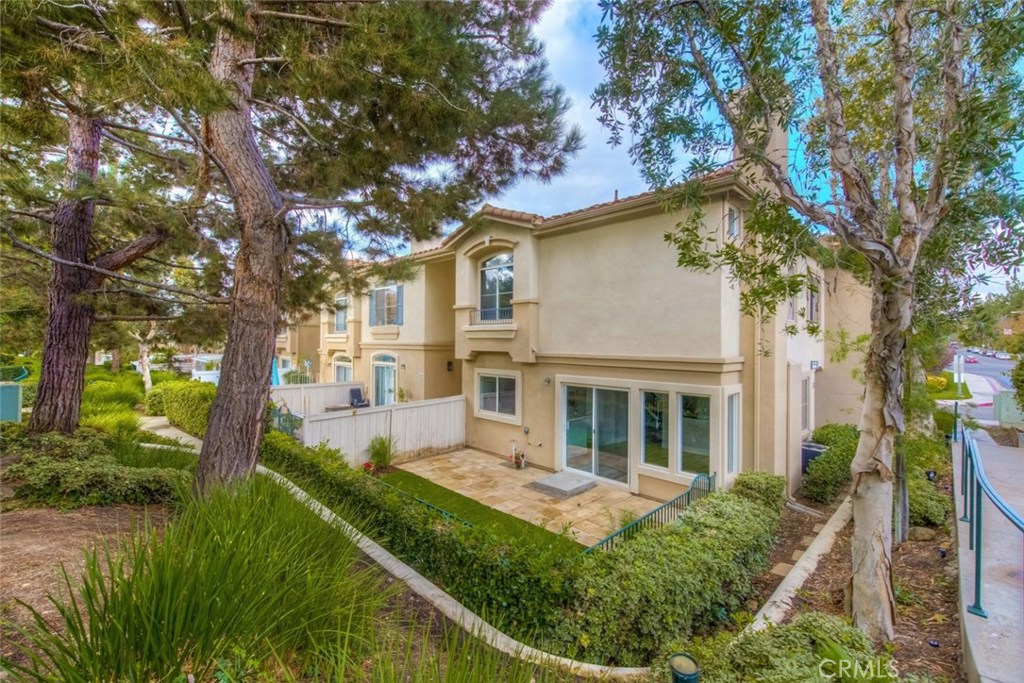 Welcome to this beautiful turnkey condo located in the scenic Bella Ventana community. The 3 bedroom, 2 bath condo complete with a newly tiled, cozy fireplace and all new wood laminate flooring is ready for it's new owner. The kitchen has been remodeled with all new white shaker cabinets, beautiful subway tile backsplash, Quartz countertops and stainless steel appliances. Upstairs offers 3 good size bedrooms with new plush carpeting and ample closet space. Both bathrooms have been upgraded with new vanities and fixtures and new tiled showers. The unit even comes complete with it's own washer and dryer hookups, direct garage access and it's own private yard. This home shows very well and is located within a beautiful complex. A great place to live!