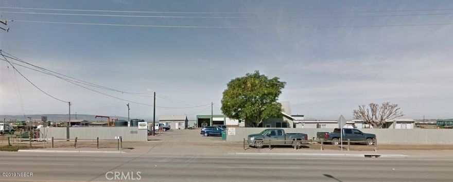 This property is located on the northwest side of Santa Maria. The potential is in the opportunity for future development. Check with the City for possible uses...it is currently utilized for vegetable farming. Two homes are used as offices, outbuildings, etc. Great producing well. Do not drive on the property.