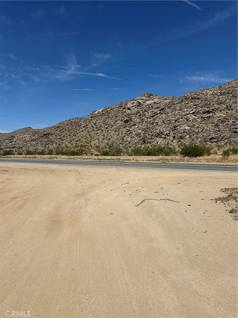 Photo of 0 Draco Rd, Lucerne Valley, CA 92356 (MLS # CV25079535)