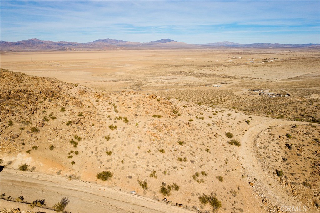 Want to be king or queen of the world? You have to come see this property! 5.387 acres on the mountainside with 360 degree BREATHTAKING views! You are not far from the dry lake beds where you could take your off road vehicles for some fun in the sun, and this location is also conveniently located close to town for amenities. Drive on by and start dreaming about how you would best utilize this unique land and location!
This property does not have an address assigned. "741 Moreno Rd" is for listing purposes only.
APN# 0451-472-06-0000
Coordinates:34.467411 /-116.978730
