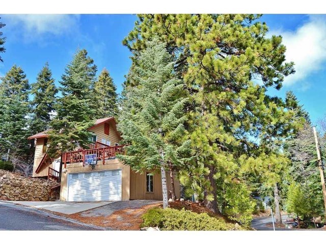 Great Home On Corner Lot In Upper Rowco. This 2 Bedroom 1.5 Bath Home Has A Big 2 Car Garage With A Huge Deck On Top For Entertaining, Wood Burning Stove Insert To Heat Those Cool Nights. New Carpet, T&G Ceilings. Great Family Neighborhood.