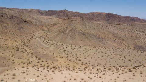 Photo of 609 Samarkand Drive, 29 Palms, CA 92277 (MLS # JT24117707)