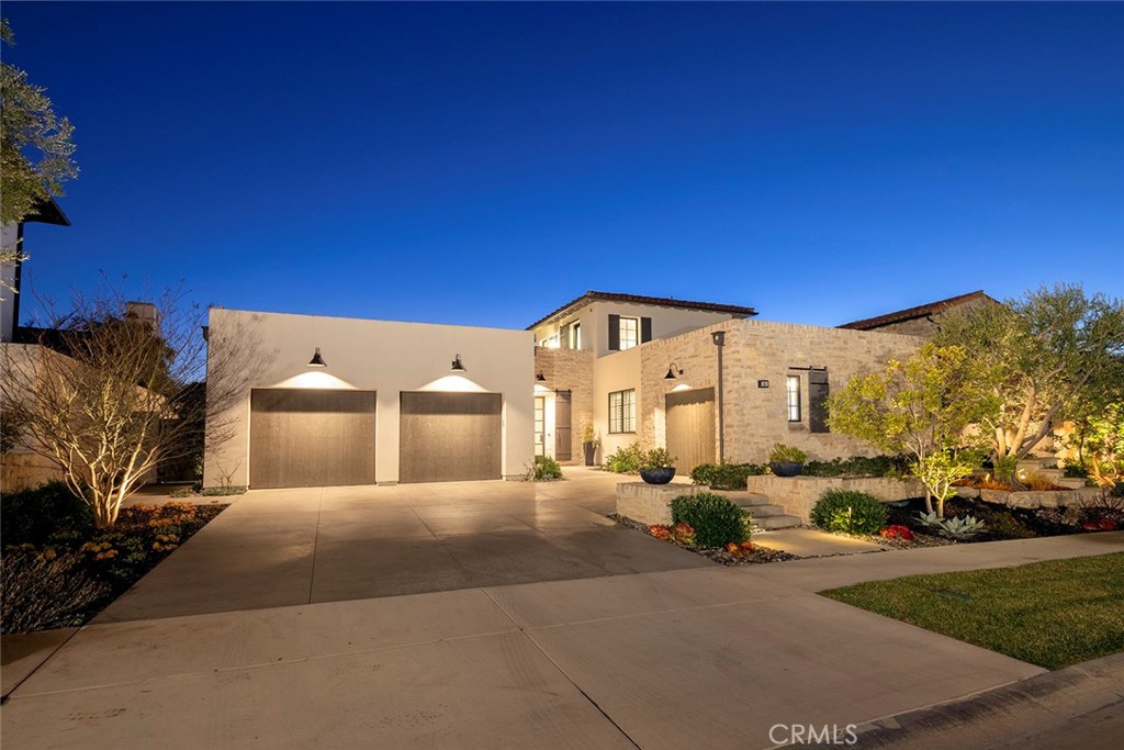 Designer Perfect and Encompassing over 3,800 square feet of luxury interior living space on primarily one level, this highly sought after, open-concept Coastal Mediterranean ocean view residence in the Coral Canyon enclave of Crystal Cove features a spacious main-level primary bedroom suite with spa-like ensuite bath and large designer closet, two additional ground floor guest suites, and a very private and separate exterior 2nd floor guest casita - the only room on the 2nd floor - with a courtyard entry stairway accented by a bubbling fountain. Once inside the main house, multiple floor-to-ceiling retractable glass doors open the kitchen, great room & dining area to several outdoor entertaining spaces, including a covered loggia and BBQ Island, a central courtyard with fire pit and custom wire-guided awnings, and a beautifully curated backyard boasting a large salt water spa and manicured landscaping. The gourmet kitchen offers a stunning over-sized island surfaced in quartzite, state-of-the-art Wolf & Subzero appliances, thoughtful cabinet & storage design, artistic lighting features, and a generous walk-in pantry. Featuring stylish, transitional design throughout, upgrades to this extraordinary home include top-of-the-line cabinetry, plantation shutters, soaring wood beamed ceiling, meticulously designed California Closets, marble countertops, 9-inch wide European oak plank flooring, RTI Home Automation, integrated Sonos speakers with surround sound, and beautiful decorative Walker Zanger tile variations throughout. The guard-gated community of Crystal Cove has much to offer its residents and guests, including the 2.5 acre Canyon Club for swimming, tennis, work-outs, entertaining and meetings. There are also parks, greenbelts and access to hiking and biking trails. Conveniently located just outside of the community gates, the Crystal Cove Promenade includes many casual and upscale options for dining and shopping. Crystal Cove State Beach sits just across Pacific Coast Hwy.