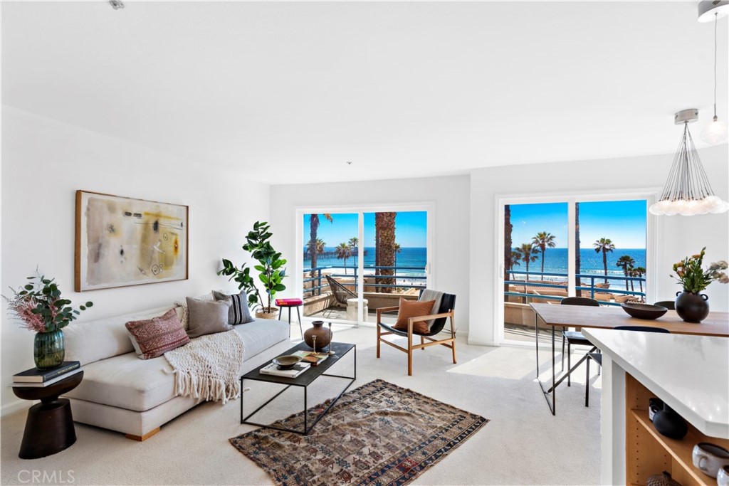 Experience breathtaking views of the Oceanside Pier, crashing waves, and sunsets from this upper level condo located in the rarely available San Miguel IV gated community. With two spacious bedrooms and 2 full baths, this property serves as the perfect second beach home or primary residence. The updated kitchen boasts sleek cabinetry, quartz counters, stainless appliances, and a breakfast bar that is open to the dining and family rooms showcasing the panoramic view. Both baths feature Quartz counters and there is fresh paint throughout. Enjoy stunning ocean views and an ocean breeze while watching the surfers from the balcony. San Miguel IV offers its residents resort style amenities including a sparkling pool and spa overlooking the beach and close proximity to the Pier and all Oceanside has to offer!