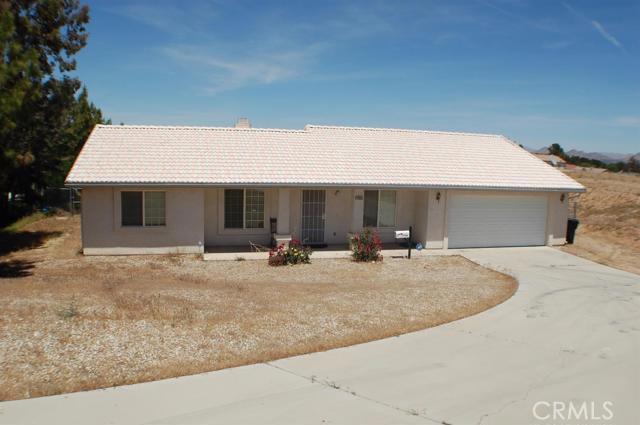 Wonderful single level home located in a great neighborhood! This home is perfect for first time home buyers! Expansive lot offers views of the mountains and hills surrounding you. This lovely home features a formal living room and formal dining room as you walk through the front door. The arched entrance to the kitchen is a nice builder touch that offers character to the home and invites you into the kitchen that boasts of an extra large pantry and extended countertop and breakfast bar. A lovely eating area sits aside large windows and is the perfect spot for a breakfast nook. Living room with cozy fireplace and beautiful French doors leading out to the extra large backyard. Another great arched doorway leads you down the hall to the guest bedrooms and bathroom. The master bedroom offers a fabulous walk in closet as well as a private master bathroom with large soaking tub and stand up shower. Enjoy the dual sinks and vanity area while you are getting ready for the day! Inside laundry room has direct access to the attached 2 car garage. RV parking on the side with plenty of space for all your toys!PRICE REDUCED FOR FAST SALE! Association Amenities: None # of RV Spaces: 0 Special Features: PTRYNONE Lot Location Type: Standard Location # of Attached Spaces: 2 # of Detached Spaces: 0