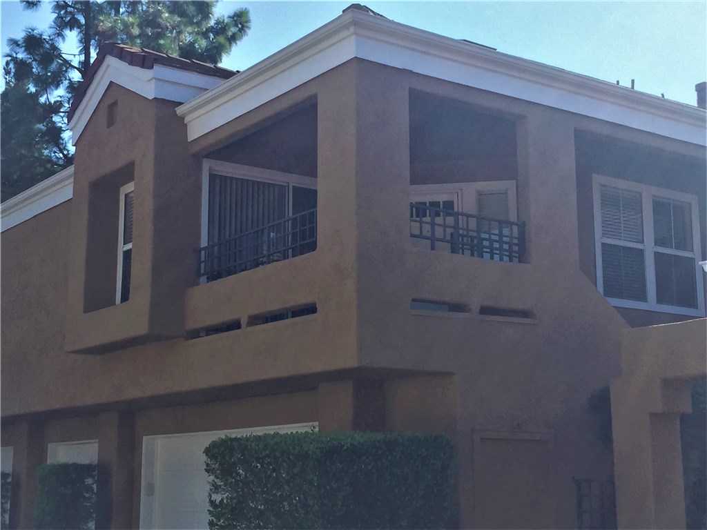 Immaculately maintained 2 bedroom home in the Oxford Court gated community. This single story, second level condo, with nobody living above, has beautiful wood flooring, recessed lights, granite countertops, and a large soaking tub in the master. Black and stainless steel appliances, plus washer, dryer, and refrigerator, all included. The schools are award winning. Restaurants, groceries, shopping and UCI are all within close proximity. There is a detached, 2 car garage and one guest parking pass. No pets, but owner will consider allowing guarantors. Available for immediate move in.
