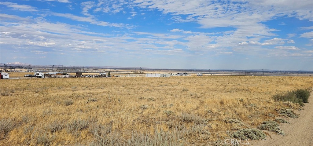 INVESTORS / LAND BANKERS! Westside 2.5 acre parcel. Solar fields nearby to the southeast. Flat.