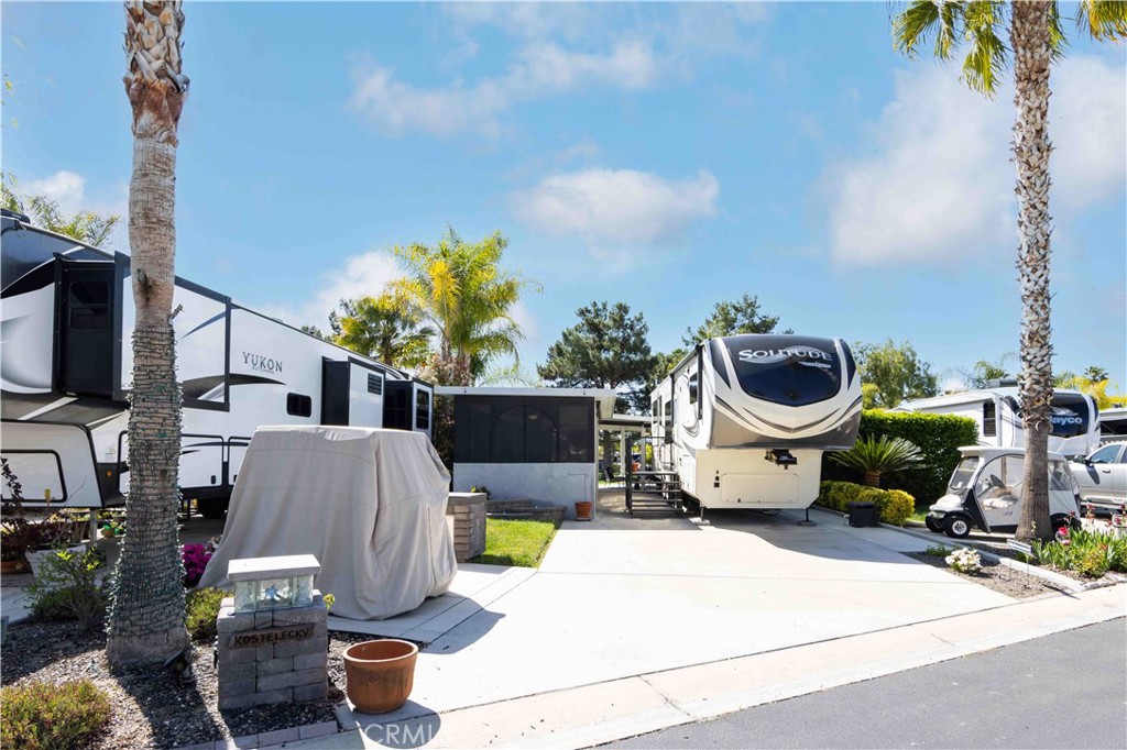 Dreams Do Come True!
Located on Hole #10 this lot offers one of the most scenic views at the Ranch.
Entertain family and friends year-round in this totally screened Alumawood build-out.Close to Main Club House, Pickleball,tennis courts, Swimming Pool & Hot Tub
Amenities include:
Plenty of cabinetry for storage, kitchen sink, dishwasher, range & oven, refrigerator, grill, washer/dryer, and much more.
Don’t let the sun set on this lot without you being there to enjoy it.