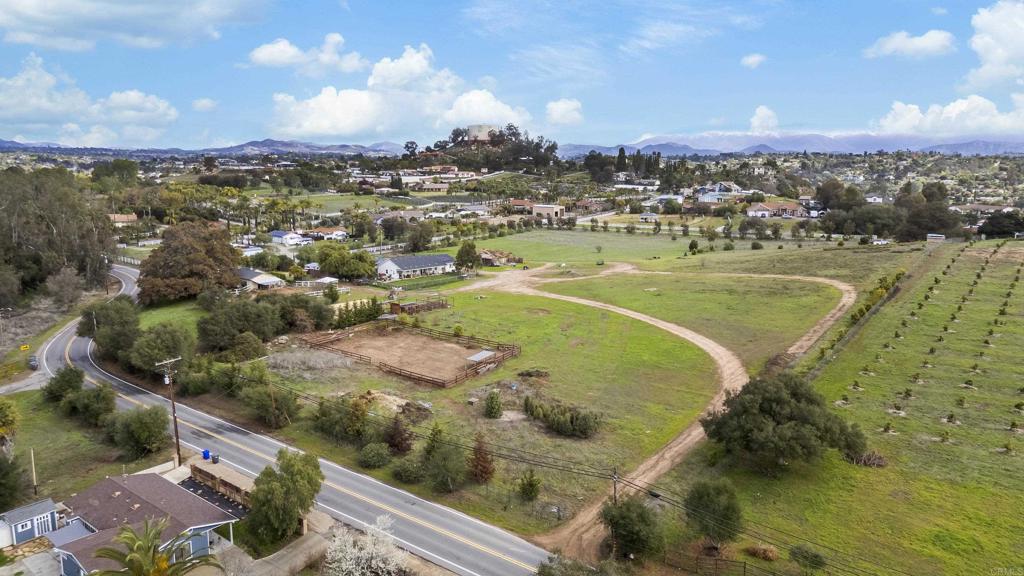 PRIME LOCATION!!! Beautiful 2.5-acre VIEW lot located in the heart of Fallbrook's desirable Olive Hill Road. This property offers easy accessibility and the perfect canvas for your dream home or investment project. With its mostly level terrain and street frontage, the possibilities for development are endless. Seller will guarantee installation of road, septic approval, runoff requirements and utilities once escrow is closed. Property will have a new road with cut-de-sac, utilities and fire hydrant Please review supplemental attachments. *Up to 10 acres available for purchase which includes two existing homes. Don't miss this rare opportunity to own a piece of Fallbrook's finest land.