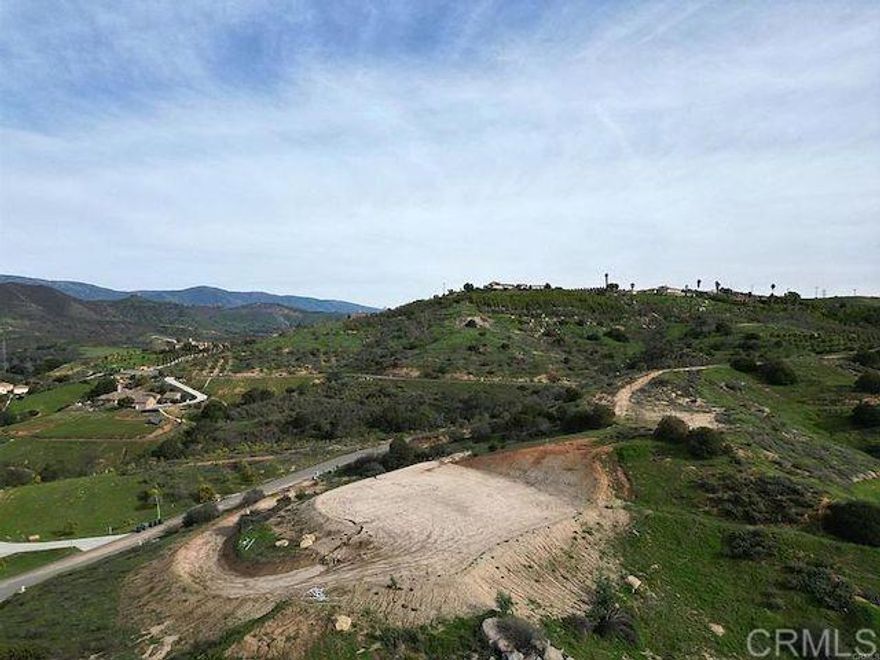 BUILD YOUR DREAM HOME ON 4.65 ACRES OF OPPORTUNITY! This ready to build lot offers 4.65 acres of potential in a beautiful, peaceful setting surrounded by custom homes and stunning views. The property features a gently sloping terrain with a graded pad, septic approval for a 3bed, 2 bath home and architectural plans included saving you time and money! Essential utilities are already in place, including a water meter, fire hydrant and underground electricity at the road. Just 15 minutes from I-15, you get the perfect balance of tranquility and convenience. Don't miss this rare opportunity to bring your vision to life in a growing area with endless potential. Make your dream home a reality, schedule a viewing today!