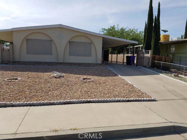 Beautiful, well kept home, very clean and well-lit . Stainless steel stove and hood,in kitchen with stainless steel sink. Upgraded tile counters and floor in master bath room, with newer sink and toilet. Newer flooring in other bathroom, with newer toilet. Newer lighting through out home. Tile entry way, with carpet through out. Linoleum floor in kitchen, and sun room. Sun room is an addition, it's approximately 10 x 20. # of RV Spaces: 0 Special Features: TS,WSEC,SH,,WB,GZGOLF Lot Location Type: Standard Location Special Features: Underground Util: # of Attached Spaces: 0 # of Detached Spaces: 0