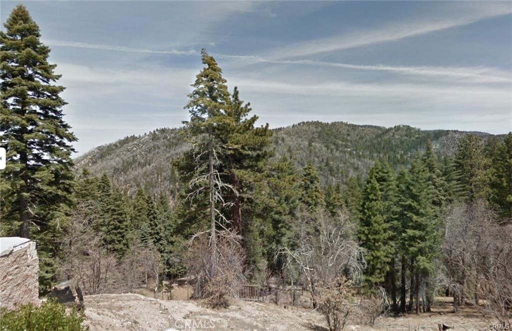 Beautiful downslope lot sitting on the BLM...nature all around. North facing view of the forest. Build your dream home/cabin. Utilities at the street. Lot had existing cabin years ago, ready for a new build!
Minutes to snow skiing (now part of a popular ski pass network.) Buyer to verify all current building codes with appropriate agencies and confirm fees for connection to services. Quiet, serene location for your home or cabin!
Agent is owner.