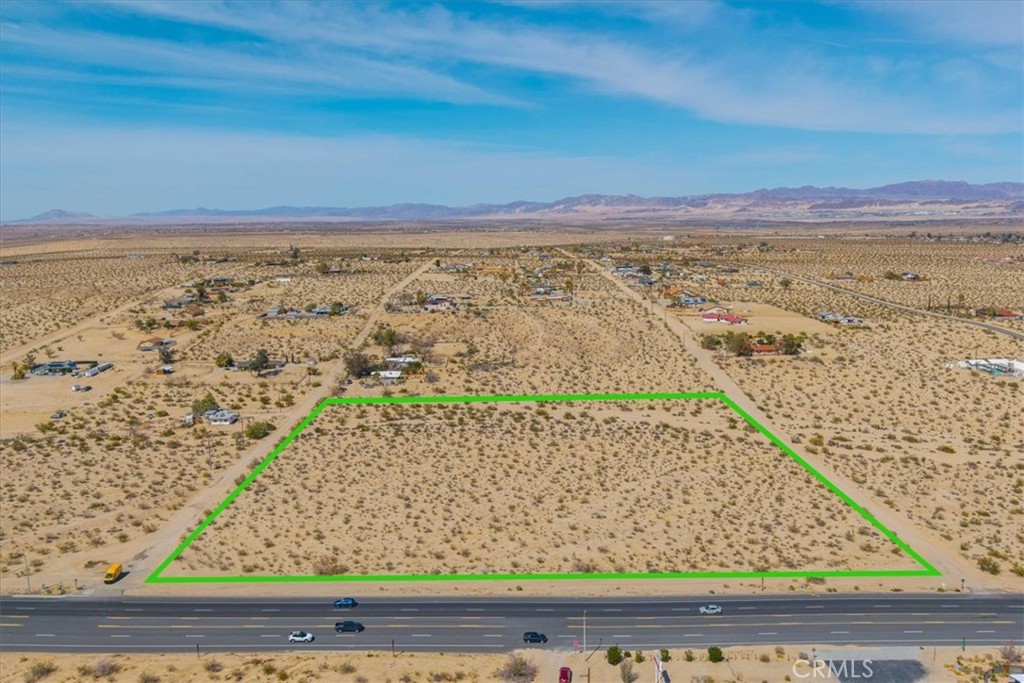This expansive 8.67-acre lot offers an incredible opportunity to build your dream home, business, or investment property in one of the most desirable neighborhoods. With valuable highway frontage, the property boasts excellent visibility and accessibility, making it perfect for residential or possible commercial development. Property Features: Size: 8.67 acres, Highway frontage for easy access and exposure, Electric and water utilities nearby, Located in a highly sought-out neighborhood, Close to downtown 29, Project Phoenix and the breathtaking Joshua Tree National Park 49 Palms Oasis Trail. With its prime location and convenient utilities nearby, this lot is ready for your next project. Don’t miss out on this exceptional opportunity to own a piece of prime real estate in a rapidly growing area.