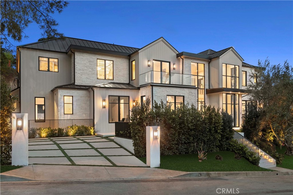 SELLER FINANCING AT 4% - CALL FOR DETAILS!!! Welcome to 550 Hanley Ave, a spectacular gem, North of Sunset! Over 10,750 square feet of exquisite quality and impeccable style. This brand-new transitional masterpiece designed by Ken Ungar features flawless materials and craftsmanship. It is replete with luxurious amenities and ideally situated on one of the most coveted streets in Brentwood. East Coast sensibility and California Cool blend seamlessly to create an environment of comfort, livability, and sophistication in this estate-quality property. Exquisite designer finishes are throughout. Entering you find a welcoming, light-filled home on a remarkably grand scale. Formal spaces, including the elegant living room, home office, dining room, and wine cellar, effortlessly transition to the more casual areas, including a chef's caliber kitchen and family room with wet bar and a dramatic fireplace. A bifold corner pocket door opens the family room to reveal a gorgeous, resort-like oversized backyard secluded and surrounded by lush landscaping with a resort-like pool, hot tub, BBQ/bar area. The pool house has a private bathroom, kitchen, and a fabulous living area overlooking the pool and the backyard that utilizes bi-fold glass doors to make indoor/outdoor living a perfect combination. Atop the graceful staircase or elevator, you find a comfortable lounge anchoring the upper level. The grand master suite is a peaceful haven with a fireplace, spa-like bathroom, private balcony, and two expansive, elegant walk-in closets reminiscent of posh designer boutiques. There are three additional bedrooms upstairs, a fifth bedroom on the main level, and a sixth bedroom on the lower level. The lower level is a proper entertainer's paradise, with a wet bar, second family room, sizeable professional-grade home theatre, spacious home gym, dry sauna, steam room with shower, and private massage room. The pool boasts electric covers and there is an ample three-car garage. This stunning, high caliber forever home is the ultimate bargain in its neighborhood!