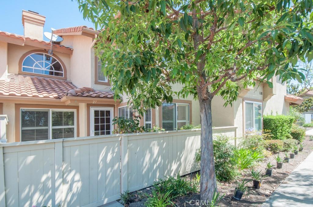 2 Bedrooms plus large loft. This beautiful Vista La Cuesta Townhouse been tastefully remodeled. Spacious living room with two story volume ceilings and cozy slate stone fireplace. Formal dining area. Remodeled gourmet kitchen with upgraded white cabinetry, granite counters, travertine flooring & breakfast nook for casual dining. Gorgeous wood floors flow throughout the living room, dining room, stairwell, loft and walkways. Spacious Master with retreat and two mirrored wardrobes. Master bath with dual vanities & oval tub. Spacious 2nd bedroom with private bath. Plush new carpet in both bedrooms. The large loft at the top of the stairs can be used as an office, media or play area. This pretty home has been dressed up with fresh warm beige paint, upgraded baseboards and plantation shutters. Private front courtyard to enjoy outdoor California living. Attached two car garage with direct access. Great location. Association amenities include Pool & Spa, BBQ. Walk to Lake RSM, Sand Lagoon & Beach Club. Close to schools, shops, parks, restaurants and hiking/biking trails. This is a MUST see home. You will not be disappointed! Please pardon the displaced landscaping as the community is in the midst of re-landscaping.