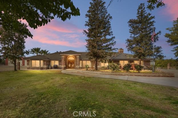 Ranch style living right here in Bakersfield. This charming horse property sits on 2.5 acers. Approximately 3,930 sqft, 7 bedrooms 3 baths split wing with a mother-n-laws quarters. Two kitchens, two separate living areas with an enclosed patio/ sun room facing the refreshing saltwater pool ideal for our hot summer days. Relax and unwind in the primary suite, beautifully updated with a walk in closet, iron soaking tub and fireplace. This stunning property features an arena, 40x60 shop perfect for storing all your toys and a large tack room. Two electric gates with remote entry giving you the extra privacy and security. This gorgeous one of a kind home won't last long, call your favorite realtor and schedule your private showing today.
