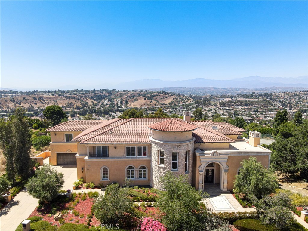 Spectacular panoramic views of Mountains and city lights, situated in the prestigious 24/7 guard-gated “The Country” community.