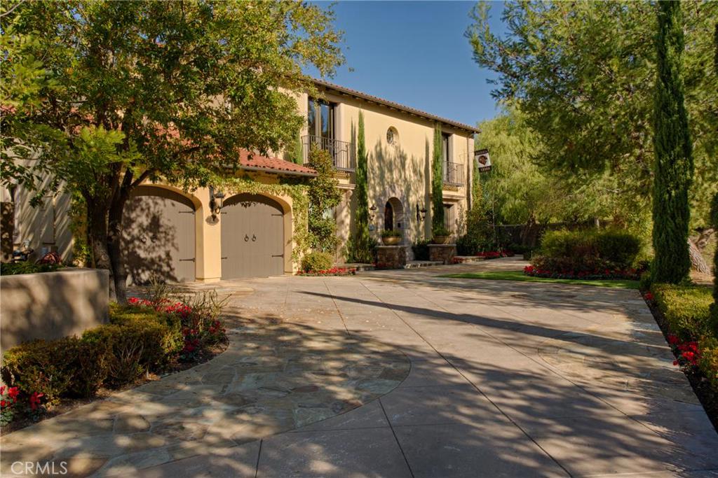 Behind the gates of The Summit in Turtle Ridge a truly a stunning home awaits. Located at the end of a cul-de-sac, on one of the community's largest lots, with views of sunrises, mountains, & city lights. This finely tuned residence offers six bedrooms, seven bathrooms, formal dining room and living room with fireplace, family room w/fireplace, a downtairs study that can easily be converted to a 7th bedroom, and a downstairs bedroom suite. The gourmet kitchen includes a Sub Zero Refrigerator, 6 burner range with griddle, Fisher Paykel dishwashers, granite countertops and custom backsplash. A temperature-controlled 300+ bottle wine closet and separate wine refrigerator in the butler's pantry will delight the most discerning oenophile. A separate catering kitchen offers extensive pantry space, dual refrigerators, freezers and downstairs laundry area. The Master Suite and retreat w/fireplace features views from every window and a master closet with island and crystal chandelier. The resort-style backyard features a swimming pool with slide, waterfalls, grotto, oversized spa, multi-sport, lined half court and a spacious cabana area complete w/outdoor kitchen, newer LED outdoor lighting, fireplace, and fire pit. Three-car tandem garage.