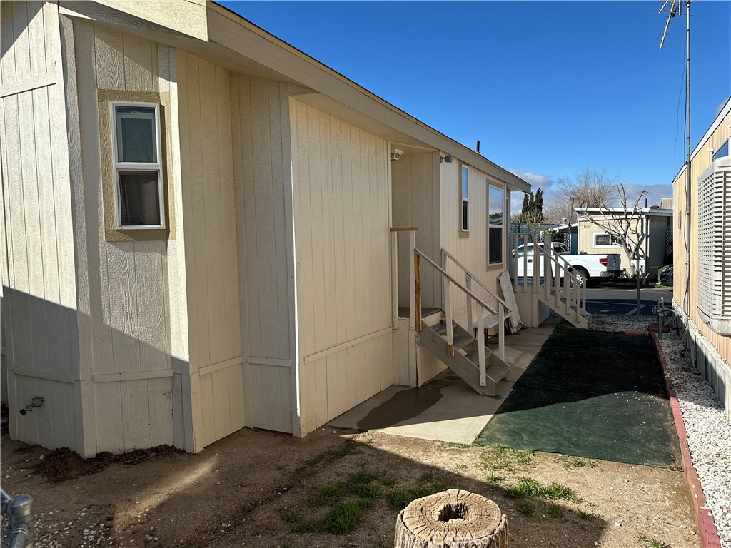 Welcome to this almost new 2021 1 bedroom, 1 bath mobile home/manufactured home! Are you looking for a great deal! You have found it! This is a very quiet mobile home park with a beautiful home to facilitate! The home features a beautiful renovated kitchen, counter tops and cabinets! Exquisite appliances, along with primary bedroom spacious closet and beautiful windows throughout the home boasting sunshine! You will enjoy your gorgeous full bathroom with updated amenities! Home comes with heater and AC System. You will love your dual sliding glass door with direct access to your spacious living room! By the way you have many options to adjust living room to your liking especially if you have kids! Are you looking for a yard, look no further, this property includes personal area on the side of home as well as the back! This is a pet friendly park with park approval! If you are looking for an upgraded home at an amazing price this is it! Park approval is required, and a land lease is due monthly, and I can get you into this home! Do not let this deal pass cash or loan is acceptable!
