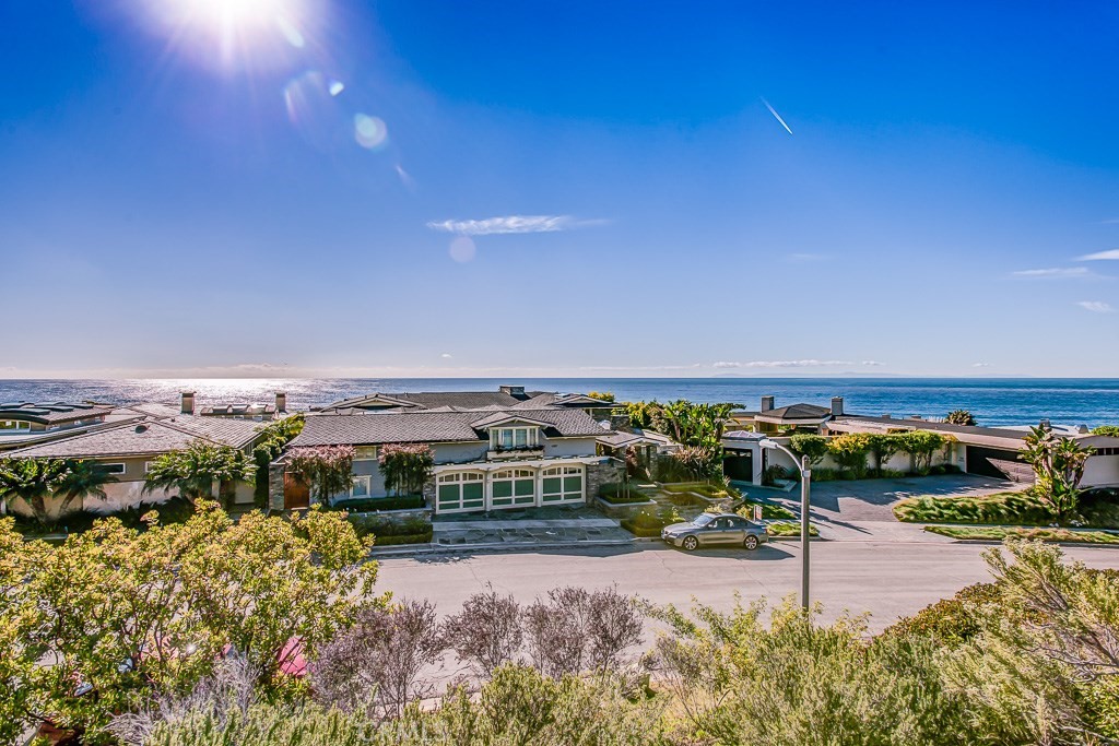 BANKRUPTCY COURT SALE. SALE PRICE REFLECTIVE OF WHEN PROPERTY WENT INTO ESCROW IN JUNE 2020.
Located in the highly sought after ocean side enclave of Cameo Shores, this custom residence embodies the design and elegance of Craftsman architecture. Just steps from gated beaches with a south-western orientation that captures 180 degree ocean views and the Newport Harbor entrance, this approximately 6,225 square foot home features 4 bedrooms with 4.5 bathrooms in the main house, plus a autonomous guest suite with living, dining, bedroom and office. Meticulously crafted with detailed molding, generous use of stone counters, rich hardwood flooring, and intricate cabinetry. Entertain in your private courtyard with pool, spa and BBQ pavilion, or take in the ocean vistas from the lower yard or one of the expansive view decks. CONTRACT LISTING AGENT FOR COURT OVERBID SALE PROCESS.