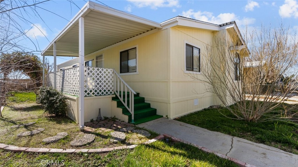 Welcome to 3303 Sierra Highway #59 nestled in Rosamond! This delightful manufactured home offers 3 bedrooms and 2 bathrooms spread across 1,272 square feet of living space. As you step inside, you'll immediately appreciate the thoughtfully designed floorplan, complemented by an abundance of natural light that fills the interior. The spacious living areas provide ample room for relaxation and entertainment. Noteworthy updates include newly installed carpet throughout the home, as well as fresh linoleum flooring in the kitchen and bathrooms. The primary bathroom boasts a modern fiberglass shower panel, while both bathrooms feature newer vanities. Recent renovations extend to the roof, which has been replaced, along with the installation of a new furnace. Plumbing fixtures in the kitchen and laundry have been updated, and new plumbing has been installed for both bathroom showers. Exterior enhancements include a fresh coat of paint and the addition of rain gutters, ensuring both aesthetic appeal and practical functionality. Conveniently located in Rosamond, this charming home offers easy access to nearby shopping, dining options, and major freeways. Don't miss the opportunity to view this lovely home - contact us today to schedule a showing!