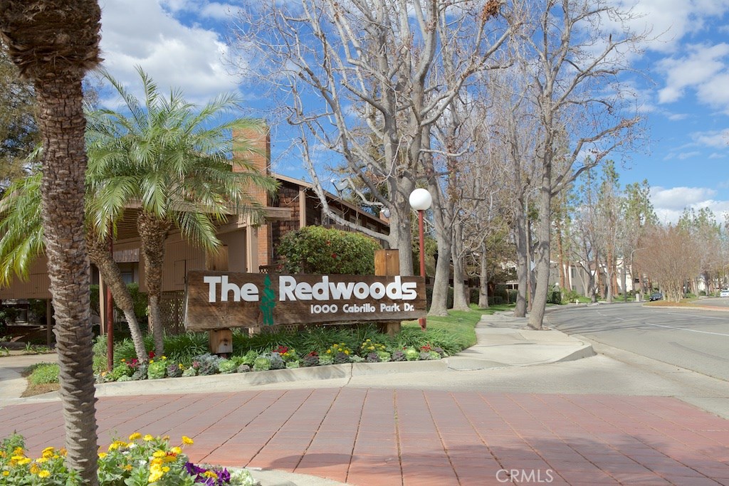 This lower-level condo end unit has been well maintained and ready for a new owner! The spacious living room with a cozy fire place and huge adjoining patio offer a great pool view. Both large bedrooms also enjoy the lovely view. The Redwoods complex is beautiful and serene with lush landscaping, streams and fountains throughout. The community has 2 pools, a spa, BBQ areas and 4 laundry facilities. Two parks (Cabrillo and Mabury) are adjacent to the property with stores and restaurants within walking distance. Freeways (5, 22 & 55) and shopping malls are conveniently close.