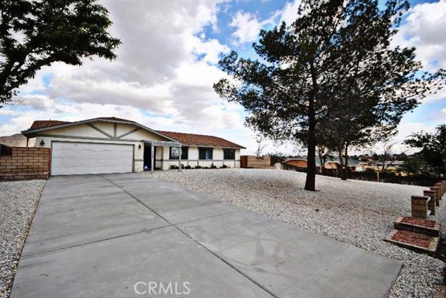JUST REDUCED!! LIKE NEW home located in the very popular North Desert Knolls area! This large lot (just under 1 acre) has great views of the mountains, is fully fenced with gate, fully landscaped front yard with water/money saving desert rockscape with some curbing, flowers & plants that are on a drip system. Property has a NEW ROOF, NEW EXTERIOR PAINT, NEW 2 TONE INTERIOR PAINT, NEW CARPET, NEW FLOORING, NEW ELECTRICAL FIXTURES (including light switches), NEW PLUMBING FIXTURES (including plumbing lines under the sink), NEW STAINLESS STEEL APPLIANCES, NEWLY STAINED CABINETS, ALL NEW HEATING AND AC UNIT INCLUDING NEW DUCTING, NEW TEXTURED CEILINGS, NEW WATER HEATER, NEW BASEBOARDS, NEW DRIVEWAY, ALL NEW DOORS, ALL NEW CLOSET DOORS, and so much more! This is a TURNKEY home that you can move right into! Association Amenities: None # of RV Spaces: 0NONE Frontage Type: Dirt Road Lot Location Type: Standard Location Special Features: None # of Attached Spaces: 2 # of Detached Spaces: 0