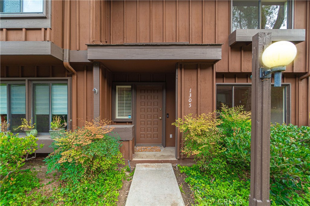 Welcome to this beautifully 3-bedroom, 3-bathroom townhouse, offering 1,598 square feet of spacious living in the highly sought-after Gardens Complex. This Sierra floor plan boasts upgrades throughout, with an open-concept living area that flows seamlessly into the dining and kitchen area. The sliding glass door leads you to an enclosed private patio perfect for entertaining or simply enjoying the Southern California sunshine. Continue through the patio to find the detached two car garage with washer and dryer hook up and plenty of storage. Upstairs, you’ll find three generously sized bedrooms, including a master suite with its own en-suite bathroom. This townhome has been freshly painted and includes new vinyl flooring and new carpet in the bedrooms. The property is equipped with central air and heating. This townhouse is located in a vibrant, tree lined community with resort-like amenities including a sparkling swimming pool and tennis court, offering relaxation and recreation just steps from your door. Situated in one of the most desirable areas of San Pedro, you’ll enjoy convenient access to local parks, beaches, shopping, dining, and top-rated schools. Don’t miss the opportunity to own this move-in-ready home in a fantastic community!