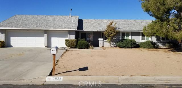 Charming 4 bedroom 2 bath home with new paint and large lot. Tile and Laminate flooring throughout. Covered patio and walk way in backyard. Everyone over the age of 18 that will be living in the home will need to apply. There is a $30.00 application fee per applicant. Dogs Okay. No cats! Association Amenities: None Special Features: Garage Door Opener