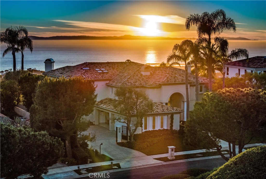 Nestled within Newport Coast's esteemed Pelican Hill gated community, this property most epitomizes luxury coastal living with its unrivaled ocean vistas, captivating sunsets, and panoramic views of Newport Beach's sparkling city lights.
Meticulously redesigned and renovated over two years, this residence seamlessly blends contemporary elegance with coastal charm. Bathed in natural light, its open-concept layout effortlessly merges indoor and outdoor spaces, inviting you to immerse yourself in the breathtaking scenery. From the dynamic Pacific Ocean to the lush canyon and verdant fairways of Pelican Hill Golf Course, each vista offers a captivating display of coastal beauty.
Discover serenity in five expansive bedrooms, each boasting its own en-suite sanctuary. The master suite on the second floor, double master bathroom, both have invincible sea view. Beckons with a private balcony overlooking the majestic coastline. Whether retreating to the dedicated office for work or indulging in cinematic delights in the well-appointed home theater, every corner of this estate exudes sophistication.
Step outside to a French-inspired garden oasis, where manicured landscapes provide a tranquil backdrop for outdoor enjoyment. Take a dip in the refreshing pool or gather with loved ones in the BBQ area for al fresco dining amid the coastal breeze. With gated privacy and security, this enclave ensures peace of mind while embracing the essence of coastal living.
Beyond its stunning aesthetics, this home seamlessly integrates intelligent technology, including a comprehensive smart home system, allowing for effortless control and connectivity at your fingertips. Air conditioning, lighting, sound system, TV, curtains, garage doors, automatic iron gate, and cinemas are all controlled through Savant App using your iPhone. Elevate your auditory experience with not one but two sets of world top Steinway sound systems, showcasing a commitment to excellence in every detail. Whole house sound system and independent movie room will definitely leave a deep impression on you.
More than just a residence, this property offers a gateway to a life of opulence, beauty, and convenience. It's a canvas for creating cherished memories against the backdrop of the Pacific's golden hues. Are you ready to embark on your coastal masterpiece?