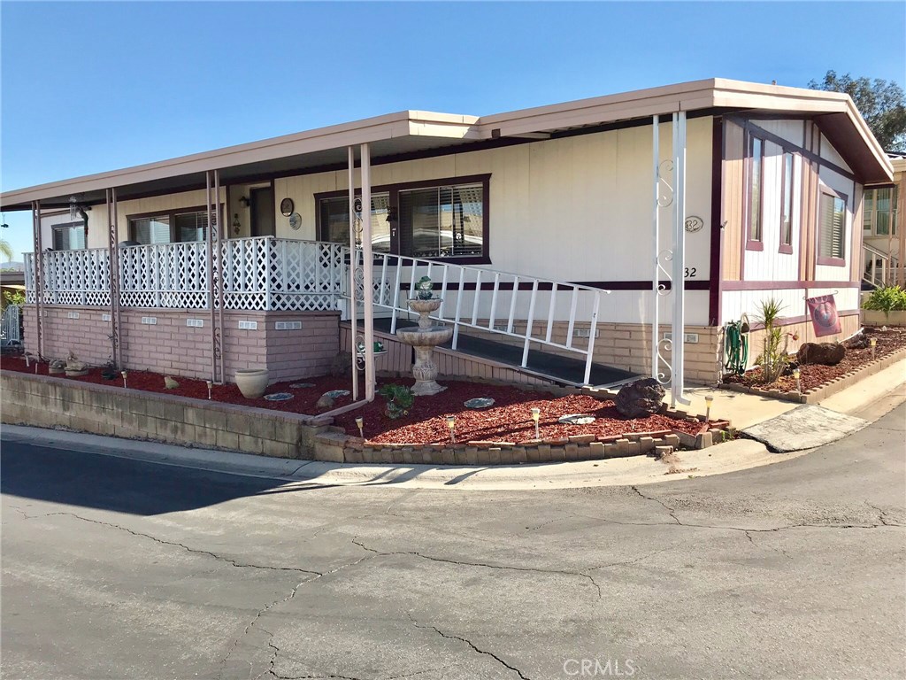 Nice mobile home located in the quiet Brea community of Bandera Estate Park. This home boasts an open layout that flows out onto a spacious front porch that creates the perfect sitting area. A separate laundry area has a washer/dryer and shelving for storage. The master bathroom has a double vanity and shower. The formal dining area leads right into into the living room space. The Bandera Estate Park is a 55 and over community that hosts several community activities. It is conveniently located within walking distance of the bustling Downtown Brea area, which has many dining, shopping and entertainment options.